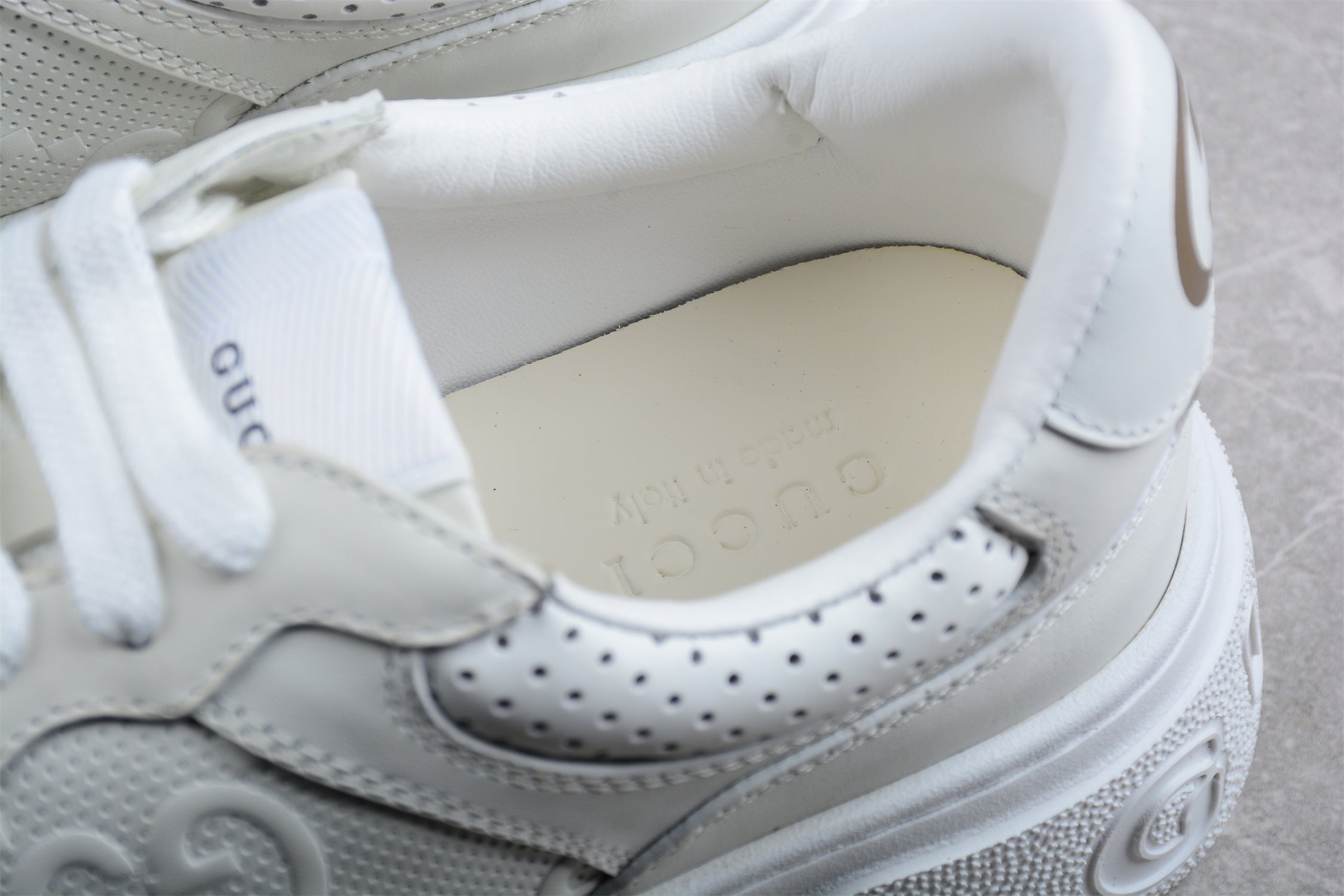 GucciUnisex Embossed GG Logo - White