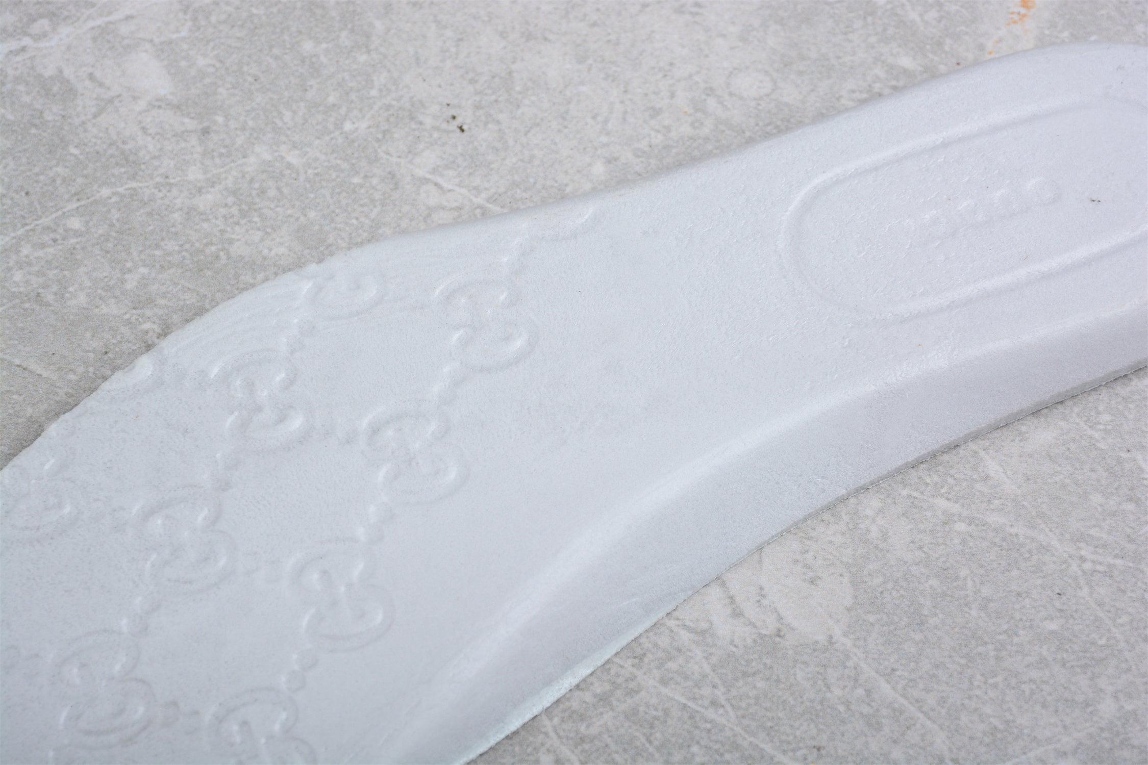 GucciUnisex Embossed GG Logo - White