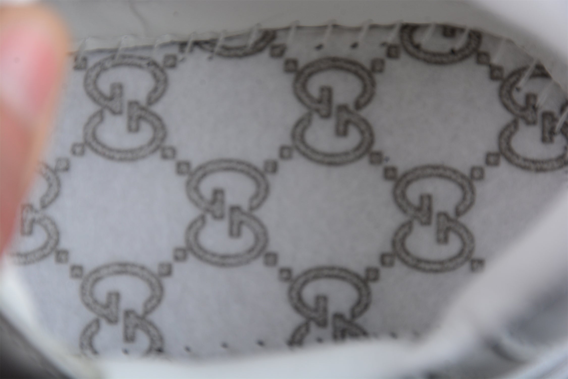 GucciUnisex Embossed GG Logo - White