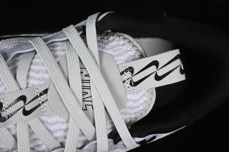 NikeUnisex Zoom Motiva - White