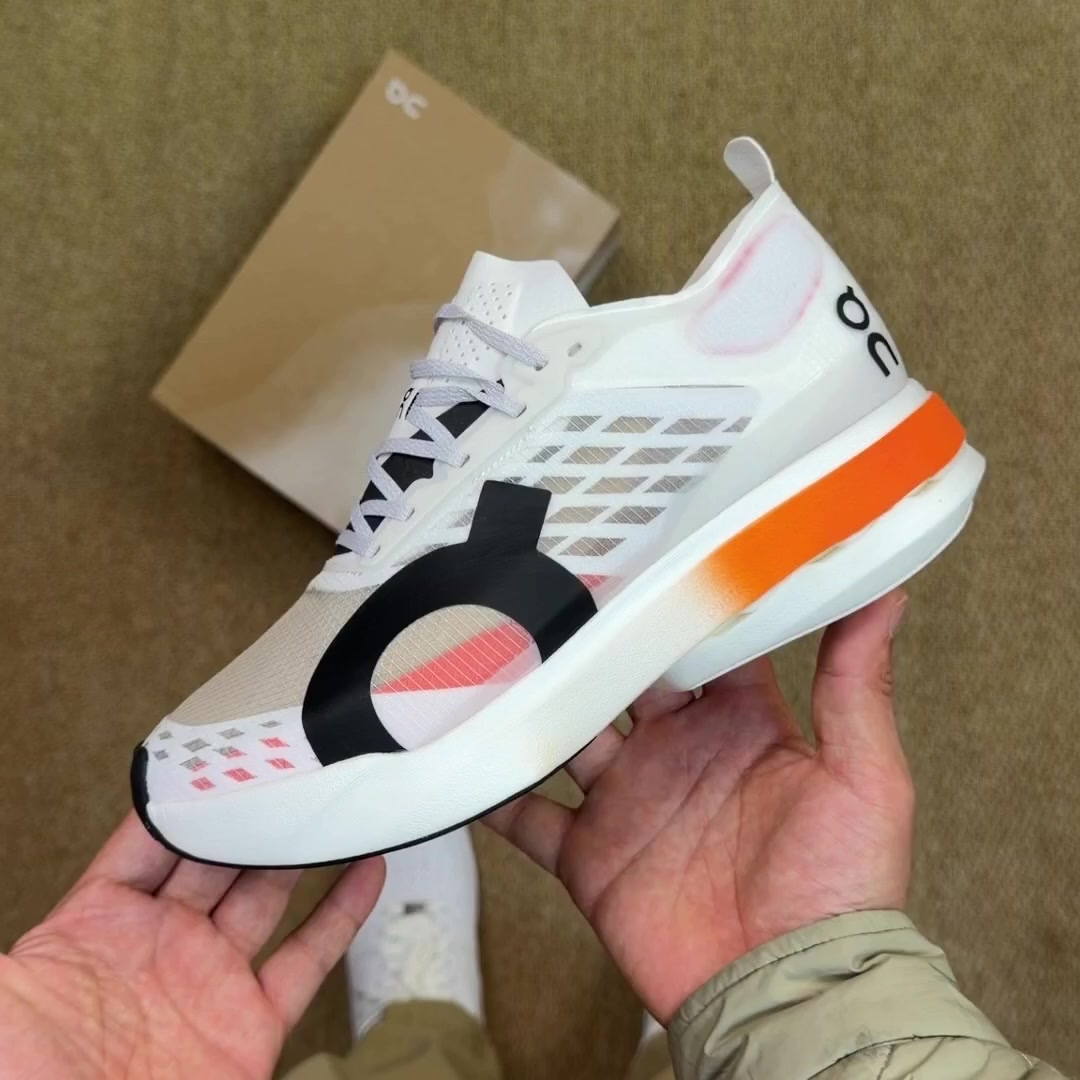 OnRunning Cloudboom Strike - "White/Orange"