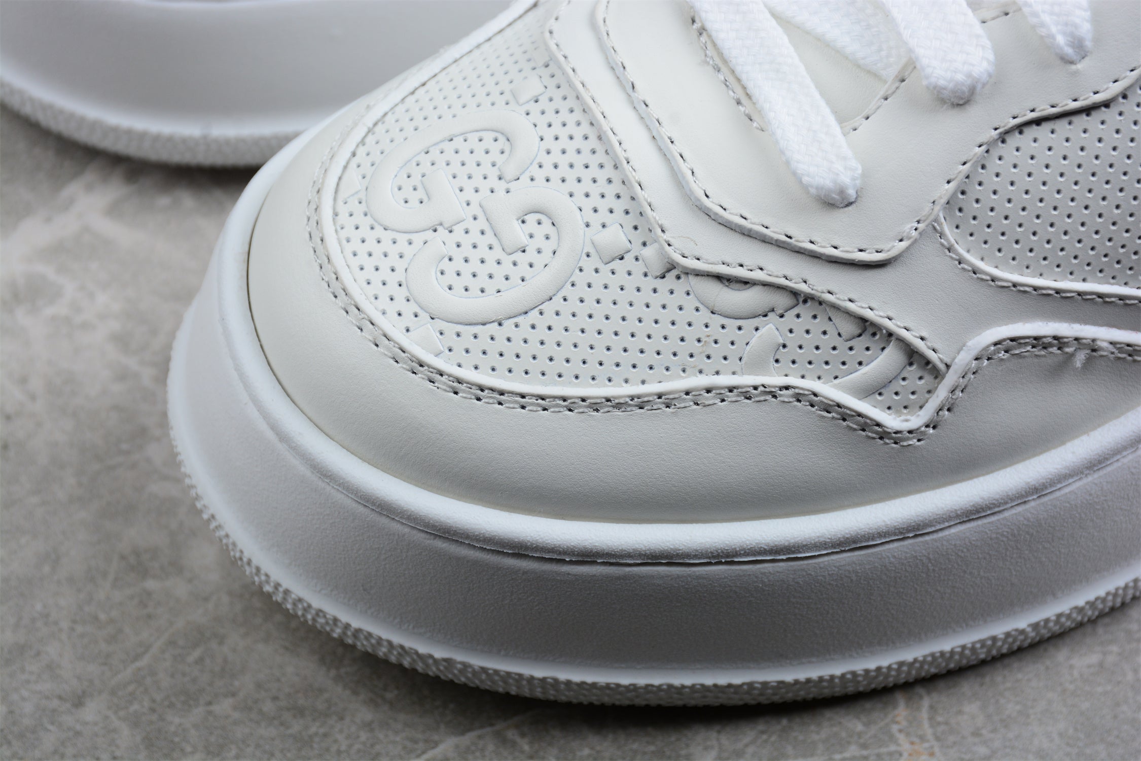 GucciUnisex Embossed GG Logo - White