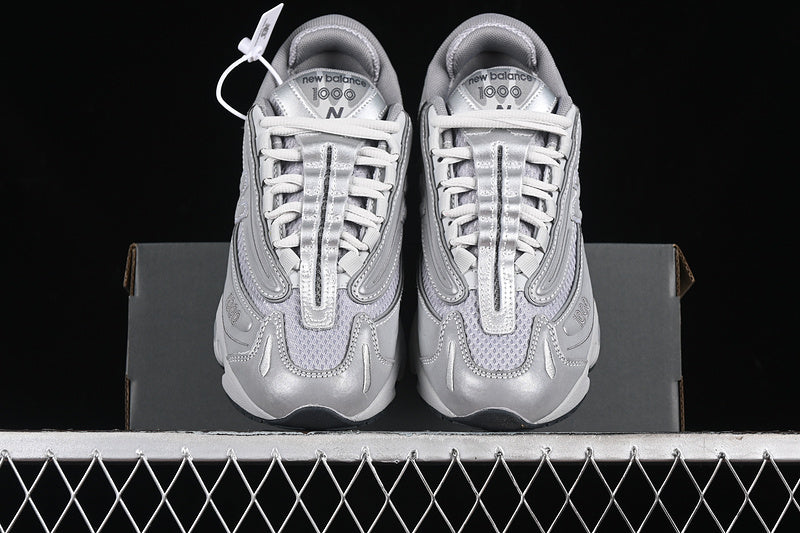 New Balance 1000 - Silver Reflective