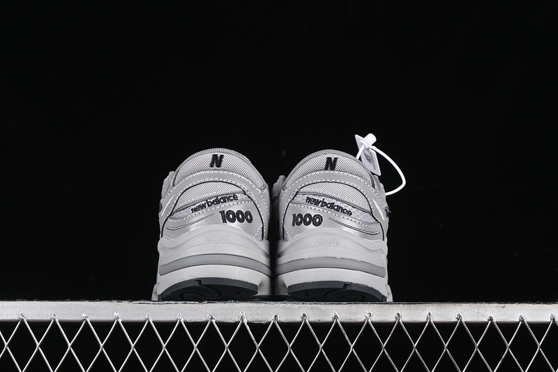 New Balance 1000 - Silver Reflective
