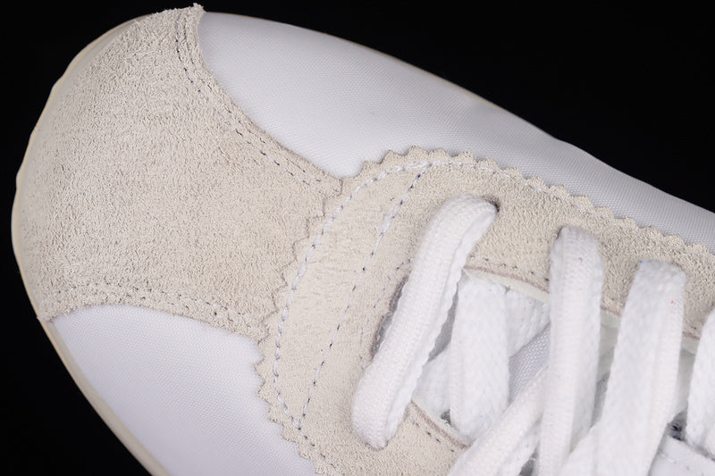 Zoom Cortez x sacai - White/University Red