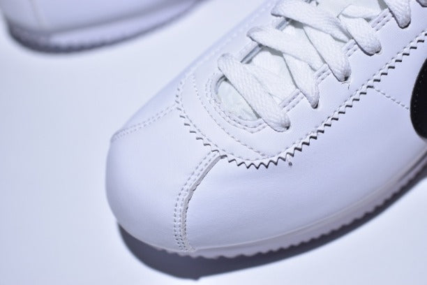 NIKEUnisex Cortez Basic Leather Casual Shoe - White/Black