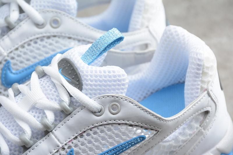 Stussy x NikeAir Zoom Spiridon Cage 2 - White University Blue