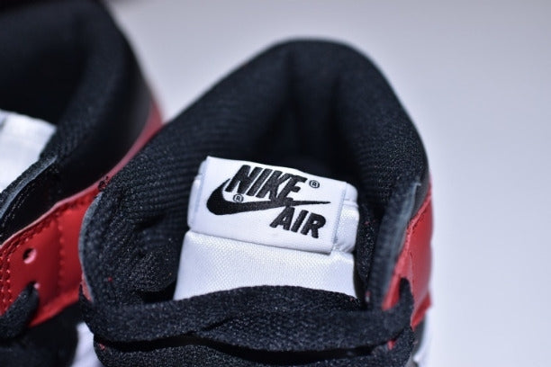 NikeUnisex Air Jordan 1 AJ1 High The Return Basketball Shoe - Black Toe