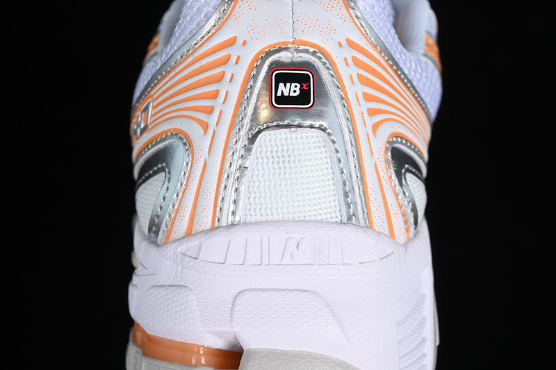 New Balance 740 - Silver/Orange