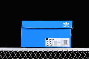 adidasMens Ozelia - Black Purple/Screaming Green